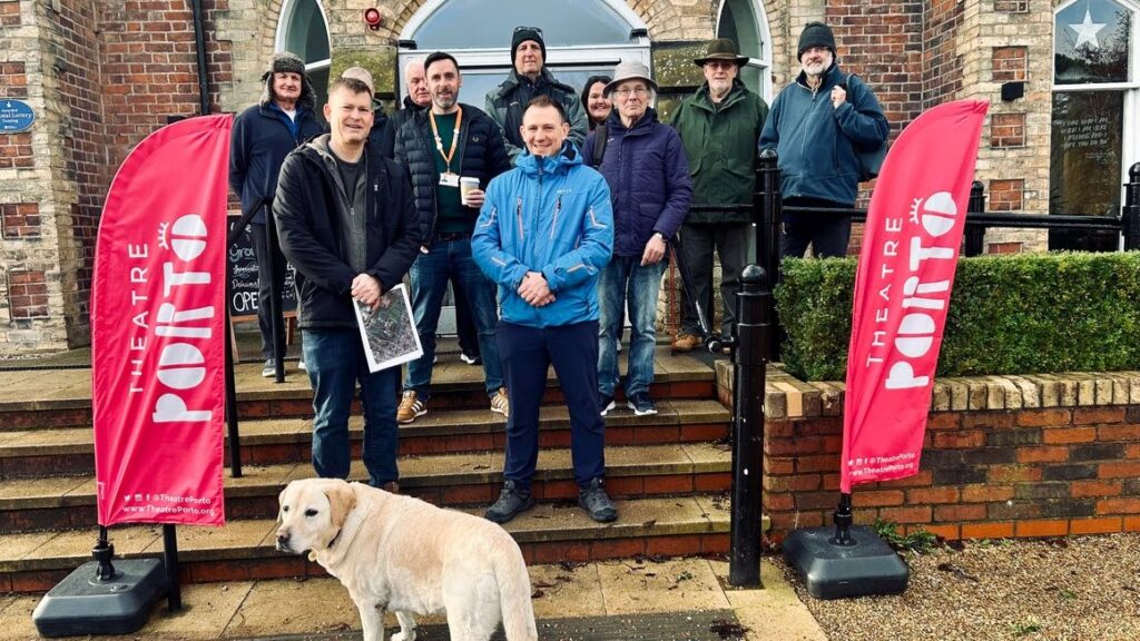 Justin Madders MP and fellow walkers gather outside Theatre Porto in Whitby Park, Ellesmere Port, as they prepare to set off on a walk and talk to promote positive wellbeing.