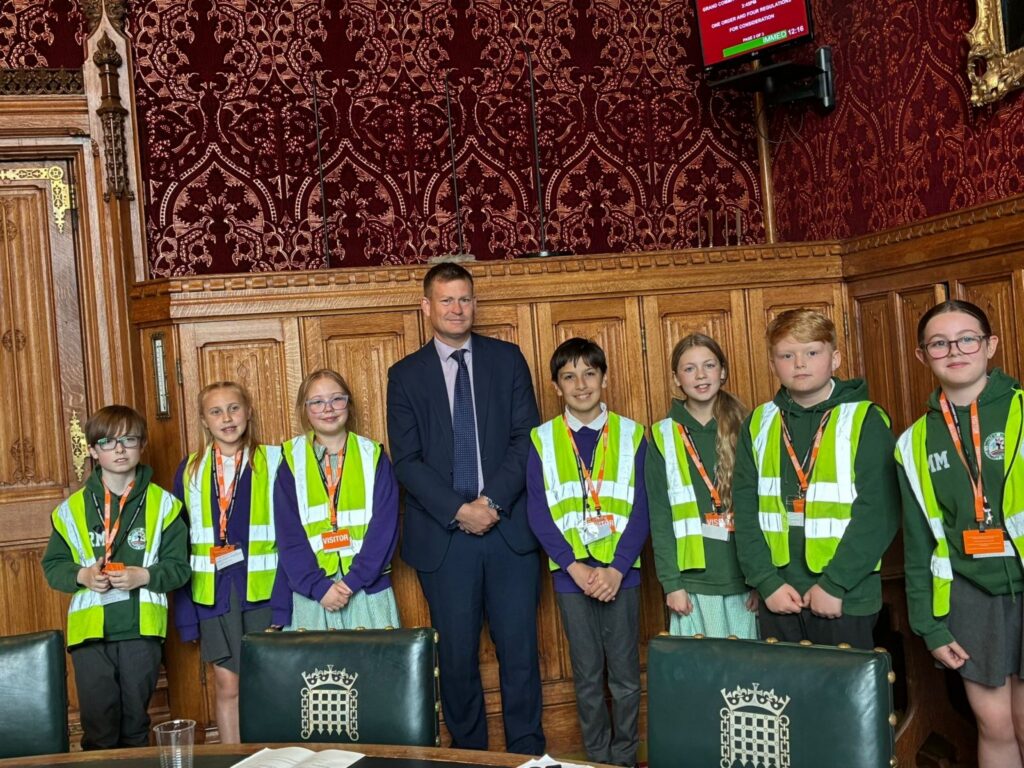 Justin Madders MP with members of the school council from Whitby Heath Primary School, who visited Parliament.