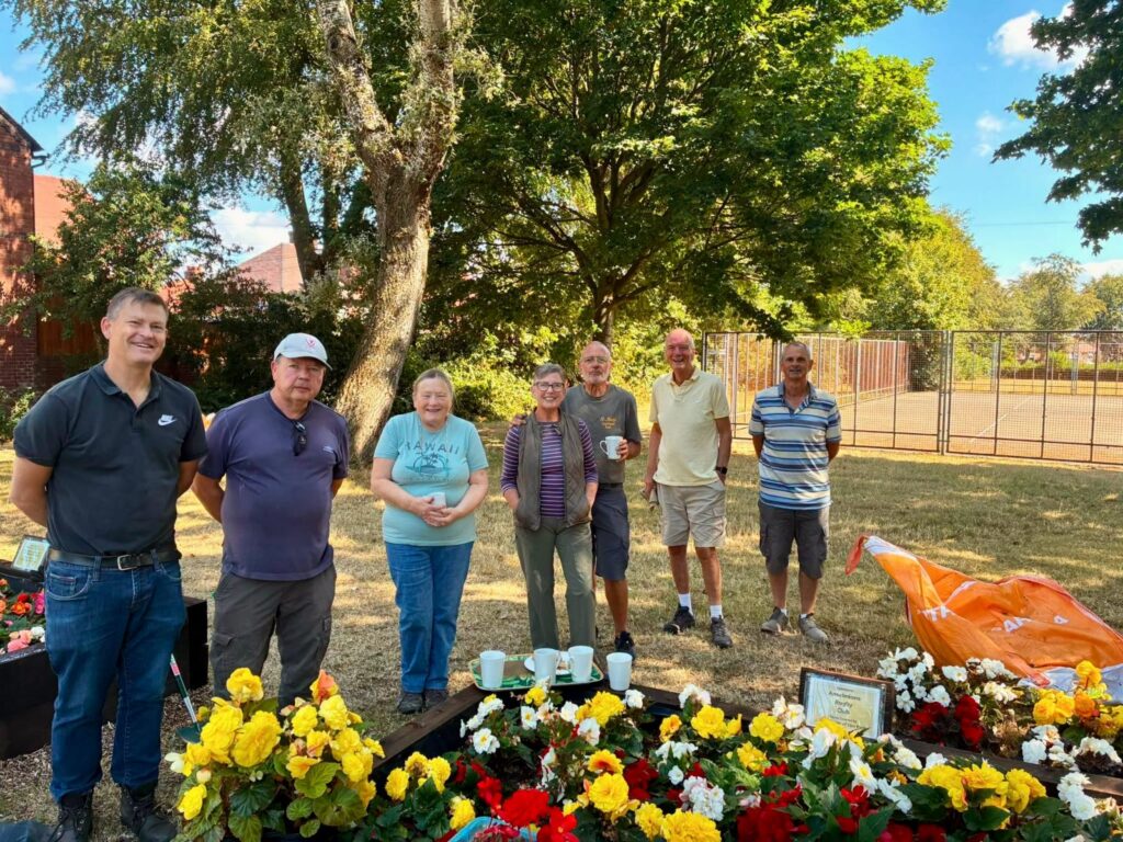 Justin Madders MP and volunteers at Torr Park in Eastham.